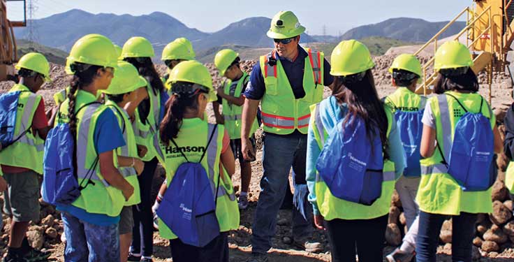 Employees at Hanson’s Santee Quarry take students from Cajon Valley Middle School on a tour of the operation. Photo courtesy of Project Cornerstone