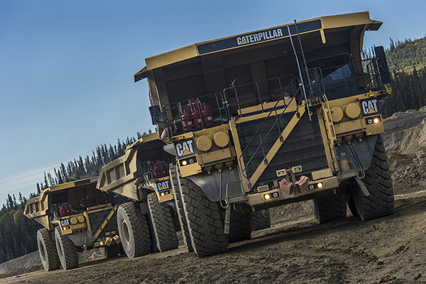 Cat mining trucks. Photo courtesy of Caterpillar.