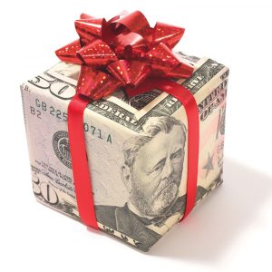 Bonuses to employees are usually considered income and, while obviously tax deductible by the aggregate business, they are taxable to the employee. Photo: iStock.com/redmal