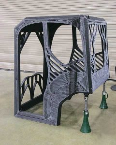 A 3-D printed excavator is being printed at the Department of Energy’s Manufacturing Demonstration Facility at the Oak Ridge National Laboratory using carbon-fiber-reinforced ABS plastic. Photo courtesy of the Oak Ridge National Laboratory, Department of Energy
