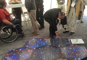 ConExpo-Con/Agg 2017 attendees check out Solar Roadways' hexagon-shaped solar panels for roads and surfaces. Photo by Megan Smalley