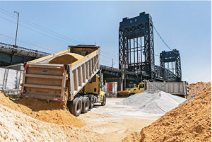 Gotham Aggregates’ barge-loading facility is a conduit for New Jersey aggregate producers to the New York City market. Photo courtesy of Superior Industries