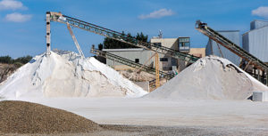 Divestitures are sometimes required to complete a deal involving crushed stone, sand and gravel operations. Photo: iStock.com/peuceta