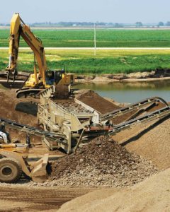 Without the aid of gravity, horizontal screens rely on large machine stroke and high g-forces to effectively move and separate material. Photo courtesy of KPI-JCI & Astec Mobile Screens