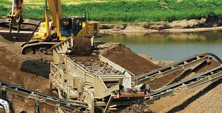 Without the aid of gravity, horizontal screens rely on large machine stroke and high g-forces to effectively move and separate material. Photo courtesy of KPI-JCI & Astec Mobile Screens