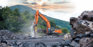 Situated near the border with West Virginia, the ZX350LC-6 excavator operates amid stunning surroundings at Boxley Materials’ Rich Patch Quarry. Photo courtesy of Hitachi
