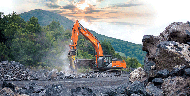 Situated near the border with West Virginia, the ZX350LC-6 excavator operates amid stunning surroundings at Boxley Materials’ Rich Patch Quarry. Photo courtesy of Hitachi