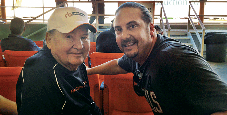 Photo:Gene Fisher, left, attended a number of equipment auctions with his son, Tommy, as he prepared him to lead Fisher Industries. Photo: Fisher Industries