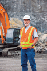Boxley Materials superintendent Steve Robertson is a proponent of the ZX350LC-6, which is used to break rock three-quarters of the year at the Rich Patch Quarry. Photo courtesy of Hitachi