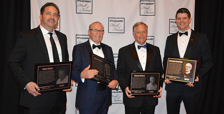 The 2019 Pit & Quarry Hall of Fame class. Pictured left to right: Tommy Fisher, who accepted on behalf of his father, Fisher Industries' Gene Fisher; Polydeck's Manfred Freissle; McLanahan Corp.'s George Sidney; and Niklas Haver, who accepted on behalf of W.S. Tyler/Haver & Boecker's Washington Samuel Tyler. Photo by Allison Barwacz