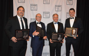 The 2019 Pit & Quarry Hall of Fame class. Pictured left to right: Tommy Fisher, who accepted on behalf of his father, Fisher Industries' Gene Fisher; Polydeck's Manfred Freissle; McLanahan Corp.'s George Sidney and Niklas Haver, who accepted on behalf of W.S. Tyler/Haver & Boecker's Washington Samuel Tyler. Photo by Allison Barwacz