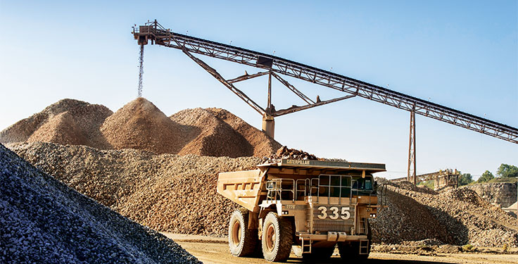 A Caterpillar 777D haul truck operator traverses a pit at Hanson Aggregates’ Bridgeport Plant in Chico, Texas. The plant, in operation since 1956, utilizes a series of 777Ds and other Cat equipment in the pit. Photo courtesy of Lehigh Hanson