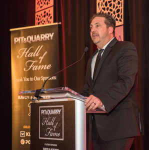 Tommy Fisher, the president and CEO of Fisher Sand & Gravel who’s pictured at the 2019 Pit & Quarry Hall of Fame Induction Ceremony, is confident his company can handle President Trump’s border wall project more efficiently. Photo by PamElla Lee Photography