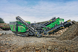 The track-and-crush feature on EvoQuip’s Cobra 290R is standard, providing operators the ability to move the machine using the optional remote control from the excavator cab without shutting down the crusher. Photo courtesy of EvoQuip.