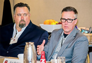 McLanahan Corp.’s Rick Madara (right), seated next to Wingra Stone’s Travis Wise, stresses that manufacturers must be upfront about their lead times and delivery capabilities. Photo courtesy of PamElla Lee Photography.