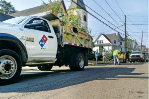 While some smirk at Domino’s “Paving for Pizza” campaign, Memphis Stone & Gravel’s Hal Williford points out that the national company is shedding light on a problem that’s dear to the aggregate industry. Photo courtesy of Domino’s Pizza.