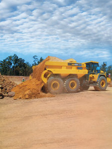 Because the blade of a rear-eject body pushes materials out at a steady rate, the truck maintains a lower and more balanced center of gravity. Photo courtesy of Philippi-Hagenbuch