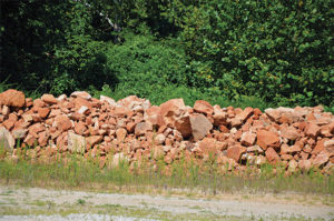 Lile Quarry is currently piling up sandstone that’s being utilized as a decorative rock, but Jim Lile sees good opportunity for the material because it is abrasive and very pure. Eventually, Lile intends to add a sand plant to process the material. Photo courtesy of Kevin Yanik