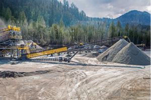 TeleStacker conveyors are utilized to trim barge loads, ultimately allowing for higher-volume loads while eliminating material segregation. Photo courtesy of Superior Industries