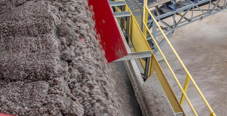Motor wiring draped across a vibrating motor to the side of a dewatering screen is a dangerous condition. Check this and replace wiring as needed. Photo: McLanahan