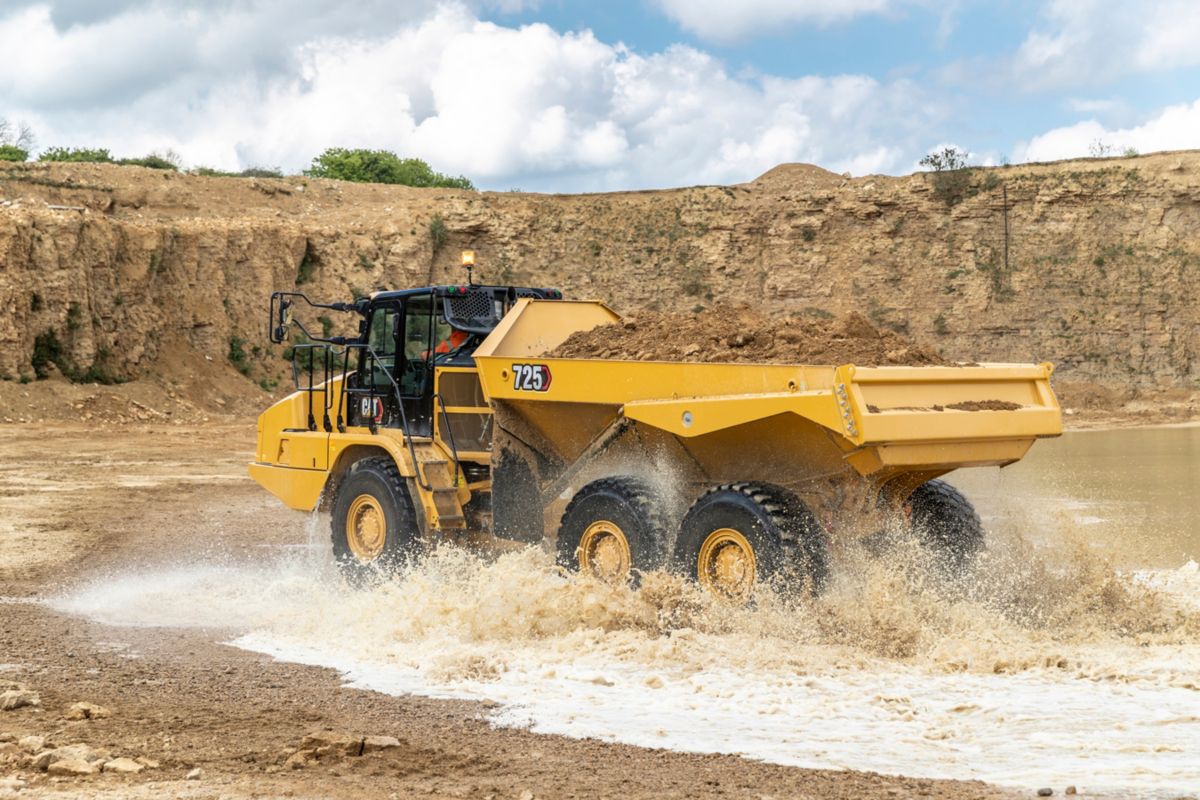 The cab on the new 725 articulated truck is a bit larger than its predecessor, Cat says. Photo: Caterpillar