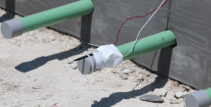Concrete sensors are helping to more precisely determine when new concrete pavement is ready to handle heavy traffic. Photo: Purdue University/Erin Easterling