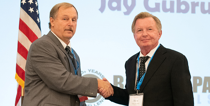 Pictured with Jim Meckstroth, at left, Lynn Radabaugh serves as Ohio Aggregates & Industrial Minerals Association board president. Photo: OAIMA
