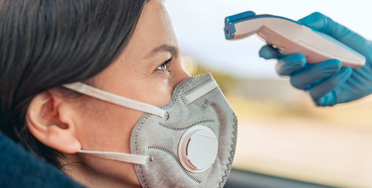 If employers prefer to handle temperature checks, Conn Maciel Carey’s Nick Scala advises them to take employee and visitor temperatures before they step foot out of vehicles upon arrival. Photo: Wojciech Kozielczyk/iStock / Getty Images Plus/Getty Images