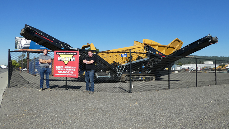 From left: Maxim Equipment sales manager Joe Jensen and general manager Greg Evans are pictured in front of an IRock mobile scalping screen at their new location in Spokane, Washington. Photo: Maxim Equipment