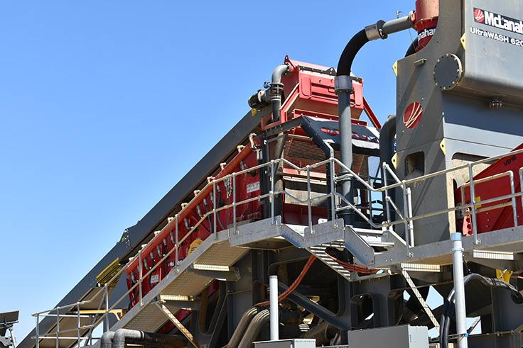 The UltraWASH features an inclined vibratory screen for sizing up to three aggregate products, as well as a sump, two pumps, two hydrocyclones and a dewatering screen. Photo: McLanahan Corp.