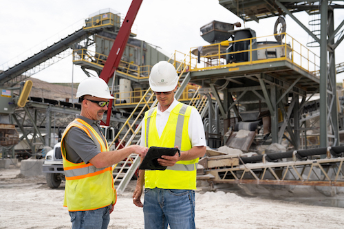 Since installing the Trimble technology, Payne & Dolan’s Spencer Johnson says operators have more control over their plants because they can access live scale results on iPads. Photo: Trimble