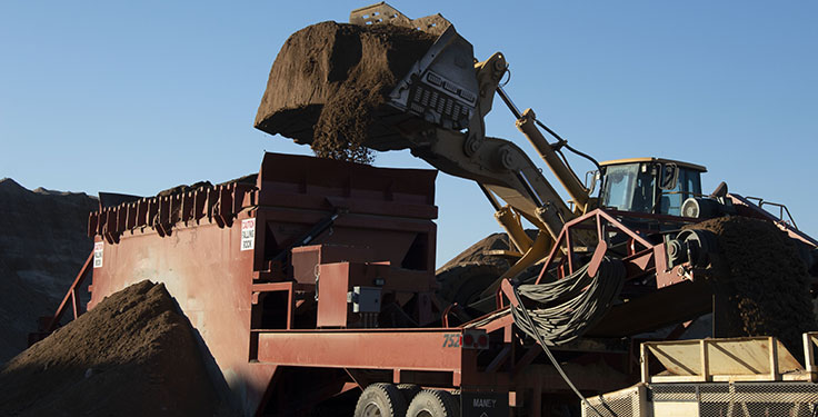 Wm. D. Scepaniak manufactures some of its own equipment, including feeders like the burnt orange one seen here. Photo: Wm. D. Scepaniak