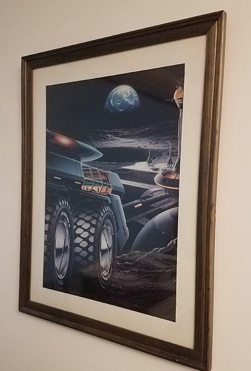 This far-off depiction of a lunar haul truck hangs in the North Coast Media office in Cleveland. Photo: P&Q Staff