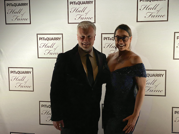 Mike Johnson, president of the National Stone, Sand & Gravel Association (NSSGA), left, and Karen Hubacz, chairwoman of the NSSGA, pose for a photo at the PIt & Quarry Hall of Fame Induction Ceremony. Photo: P&Q Staff