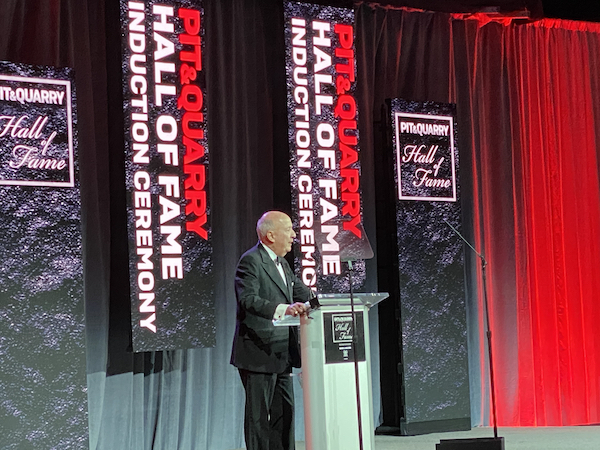 EJ Burke, a member of the Pit & Quarry Hall of Fame 2021 class, delivers his speech at the Hall of Fame Induction Ceremony. Photo: P&Q Staff