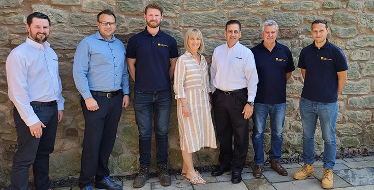 From left: David Hunter, business line director of aggregate systems at McLanahan Corp.; Cory Jenson, executive vice president of sales and business development at McLanahan; Liam Holland, business line director of RubbleCrusher; Julie Smith, CMB owner and co-founder; Sean McLanahan, president and CEO of McLanahan; Martin Brough, CMB owner and co-founder; and Matthew Brough, technical director of RubbleCrusher. Photo: McLanahan Corp.