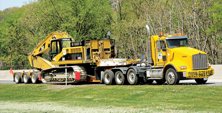 On the road and in the yard, similarity between trailers increases ease of use and operator comfort. Photo: Talbert Manufacturing