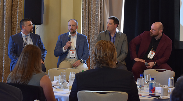A panel of aggregate producers offered insights on their use of equipment and technology to close the Pit & Quarry Roundtable Conference. Pictured from left are Jamie Jones of Capital Aggregates, Nick Pearman of Rogers Group, Dan Babish of Luck Stone and John Scepaniak of Wm. D. Scepaniak. Photo: P&Q Staff