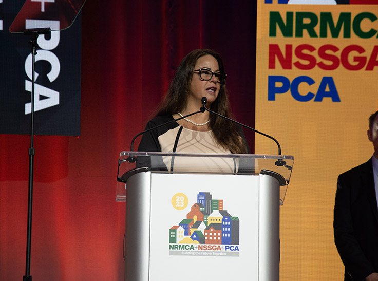 Bond Construction's Karen Hubacz, board chair of the National Stone, Sand & Gravel Association, kicks off the joint general session Monday. Photo: P&Q Staff