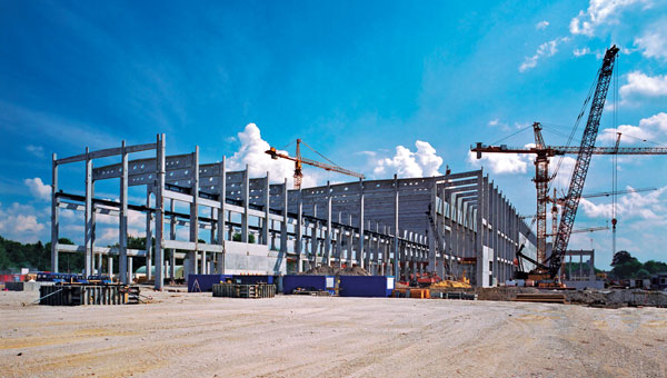 The private sector’s increasing interest in establishing manufacturing capabilities in the U.S. is stimulating the construction materials market. Photo: graemenicholson/E+/Getty Images