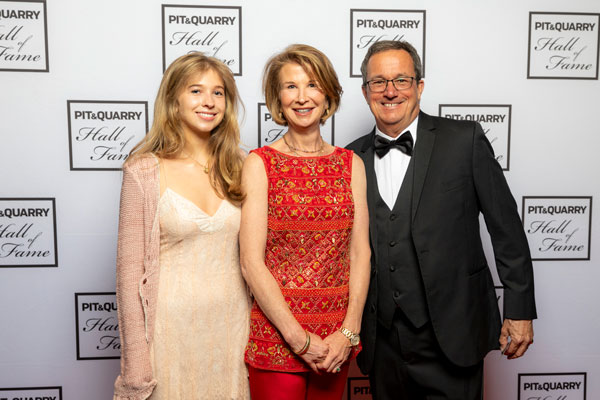 Tom Hill (right) was joined at the induction ceremony by his wife Jane (center) and daughter Ellie, among many others. Photo: Pit & Quarry