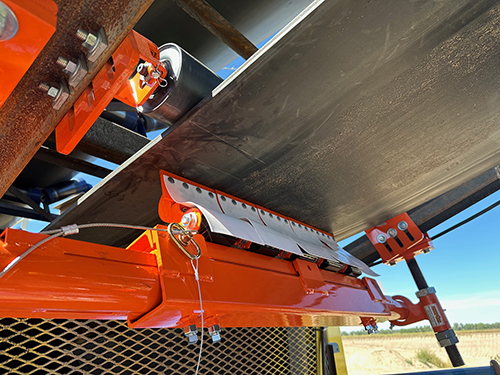 Martin Engineering’s SQC2S Orion secondary cleaner is made up of individual 6-in. blades that are mounted on a square steel tube assembly. Photo: Martin Engineering