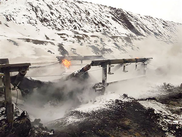 Conveyor fires can happen anywhere and at any time – even outdoors in the cold. Photo: Martin Engineering