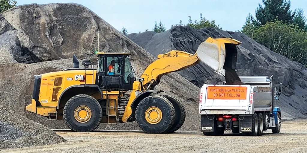 Properly matched loading and hauling equipment helps maximize payload while ensuring trucks remain within regional weight limits for safe road travel. (Photo: P&Q Staff)