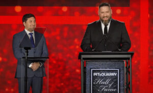 Metso’s Jeremy Polcyn (right) delivered an acceptance speech in honor of Edgar B. Symons at this year’s Pit & Quarry Hall of Fame Induction Ceremony. Metso’s Fernando Moya (left) joined Polcyn on stage. Photo: Pit & Quarry