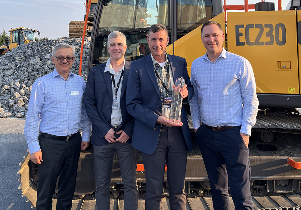Volvo Construction Equipment leaders recently presented Wood’s CRW with its top two dealer awards. Pictured here (from left) are Volvo CE’s Agako Nouch, Wood’s CRW’s Andre Parent and Chris Palmer, and Volvo CE’s Scott Young. Photo: Volvo CE