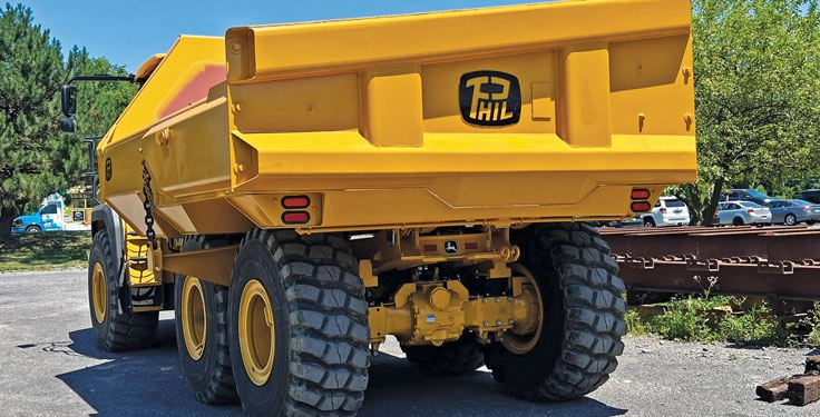 Philippi-Hagenbuch’s Josh Swank says customizing truck bodies to an operation’s specifications increases loading safety and reduces the potential for loading damage by ensuring the truck body dimensions are correctly paired with the loading tool. Photo: Philippi-Hagenbuch