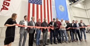 Masaba founder and CEO Jerad Higman cuts the ribbon during the grand opening of the company’s new 147,500-sq.-ft. metal fabrication facility in Vermillion, South Dakota. Photo: P&Q Staff