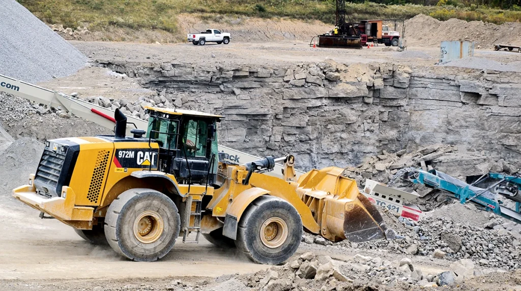 Routine preventive maintenance, including inspections of ground-engaging tools, keeps wheel loaders productive and minimizes costly downtime. (Photo: P&Q Staff)