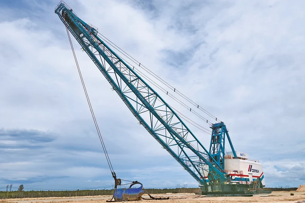Large draglines are another option for material removal in aggregate dredging operations, offering deep digging capability for underwater reserves. (Photo: P&Q Staff)